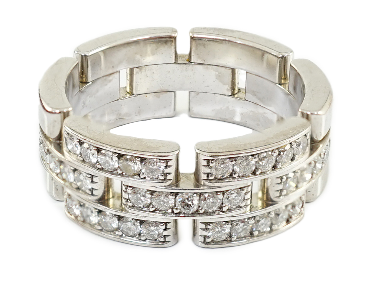 A modern Cartier 18ct white gold and diamond cluster set Panthere Maillon band